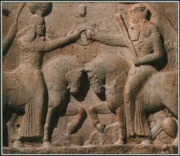 Ancient Persians associated the god Ahura Mazda with royalty, as well as with light and fire. Darius I believed that Ahura Mazda had made him king. In this stone relief, the god gives a crown to the Persian king Ardechir I.